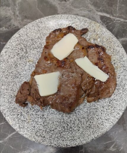 butter melting over rump steak
